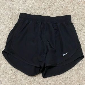 Black Nike running shorts